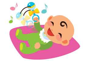 Baby is holding a colourful rattle