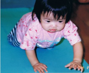 Baby crawling on a floor